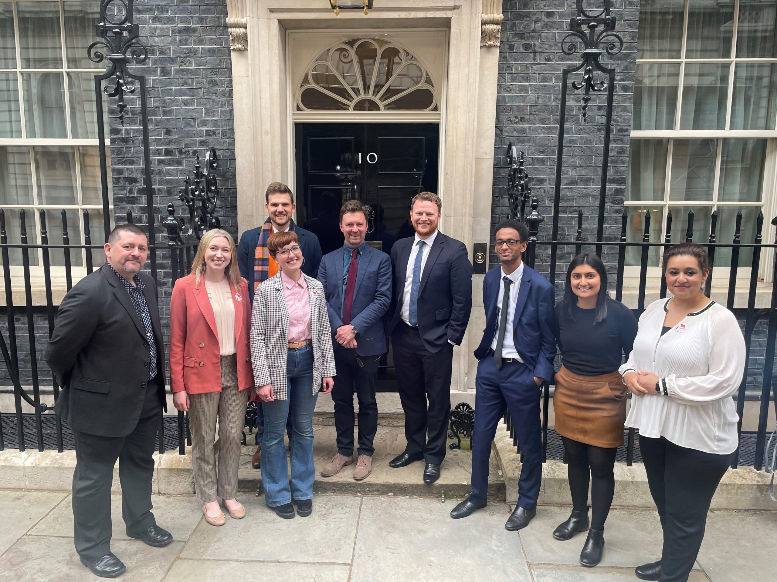 Group of professionals from Ukie standing outside of number 10 Downing Street