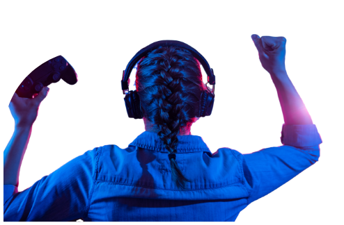 Girl celebrating with games controller in her hand