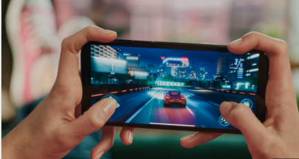 Person playing a game on a mobile phone.